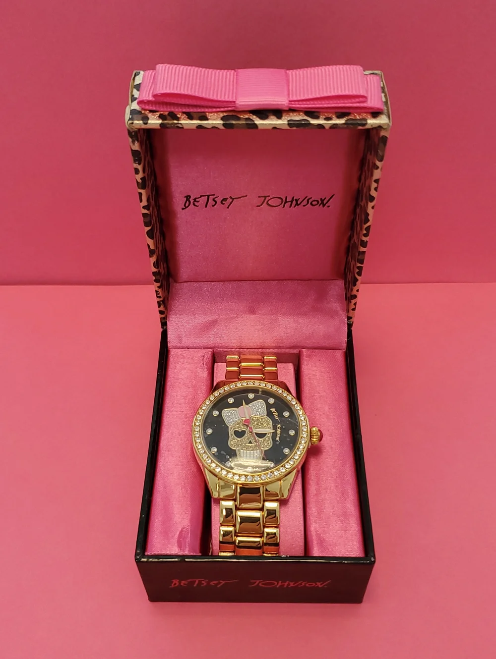 Betsey Johnson Gold-Tone Watch with Black Dial and Pink Bow Accent